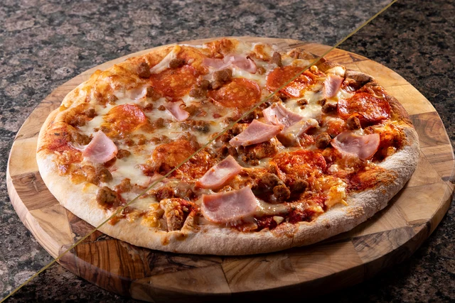 A Supermarket Pizza which cost £2.80, shown with simple light and JaxMore Food and Drink Photography specialist lighting