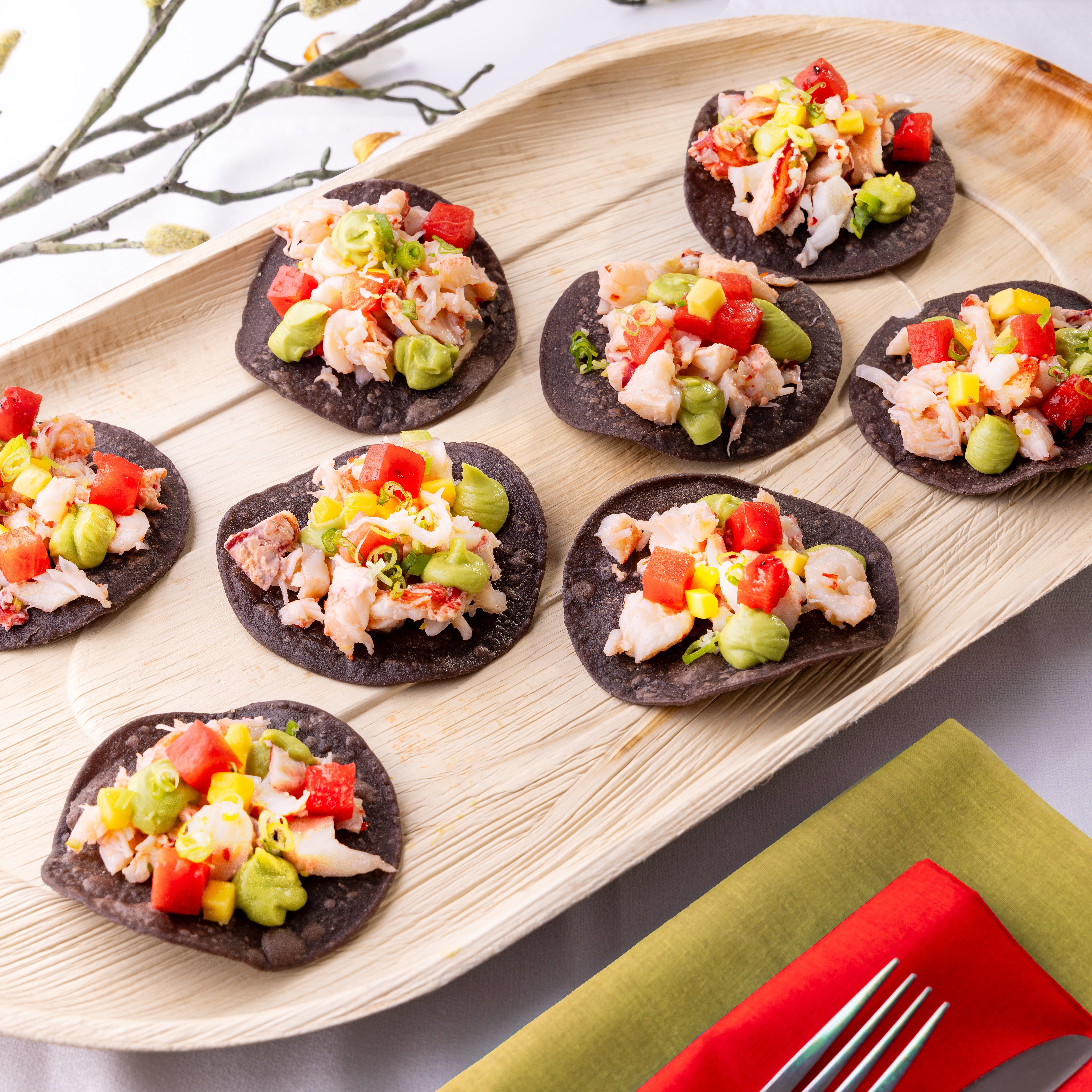 Black corn tortillas with avocado purée, pickled watermelon, fresh mango and mint cress, by Chef Nicholas Bailey. Photographed on location and in service by JaxMore Food and Drink Photography.