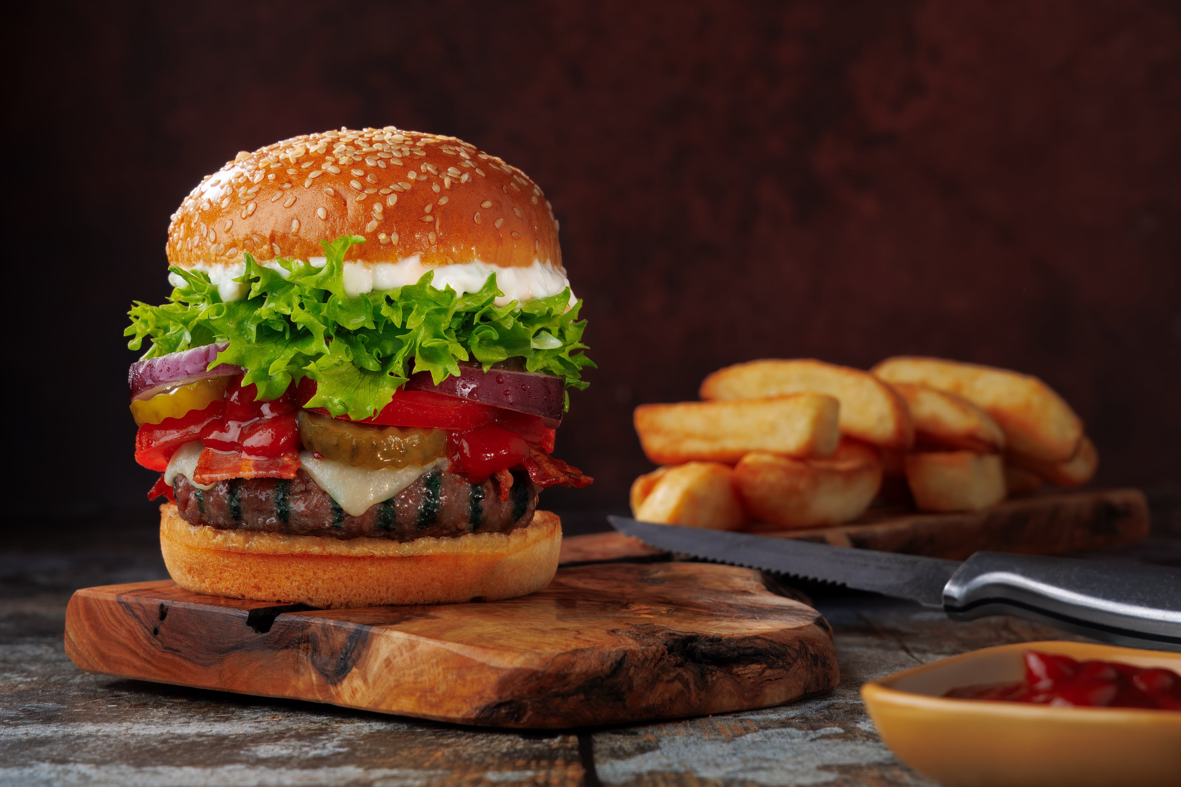 A gourmet burger, with proper chunky chips.  Styled and photographed by JaxMore Food and Drink Photography, in their Derby Studio.