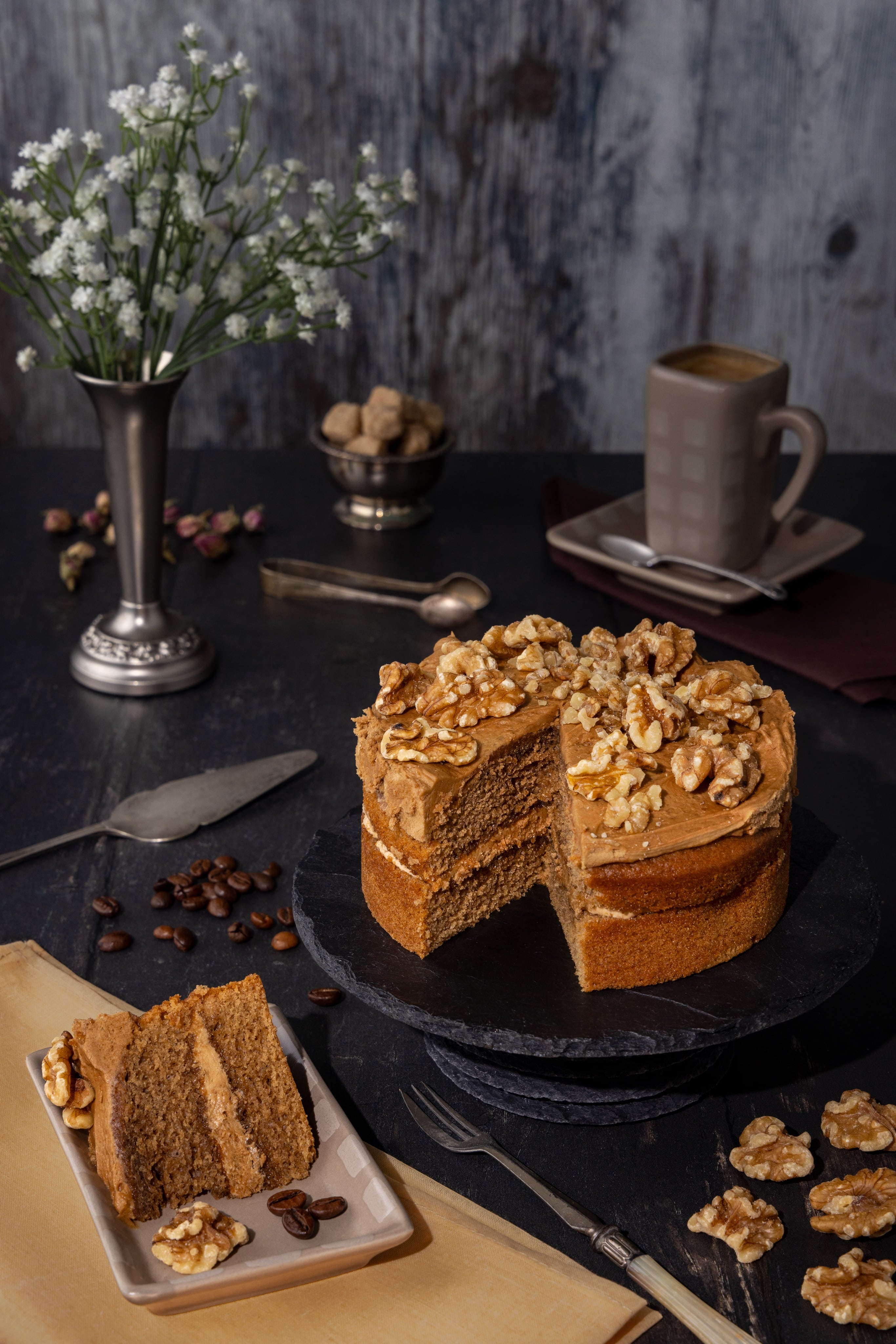 Delicious Coffee and Walnut Cake photograph.  Creative cake photography, by JaxMore Food and Drink Photography, shot in their Derby studio.