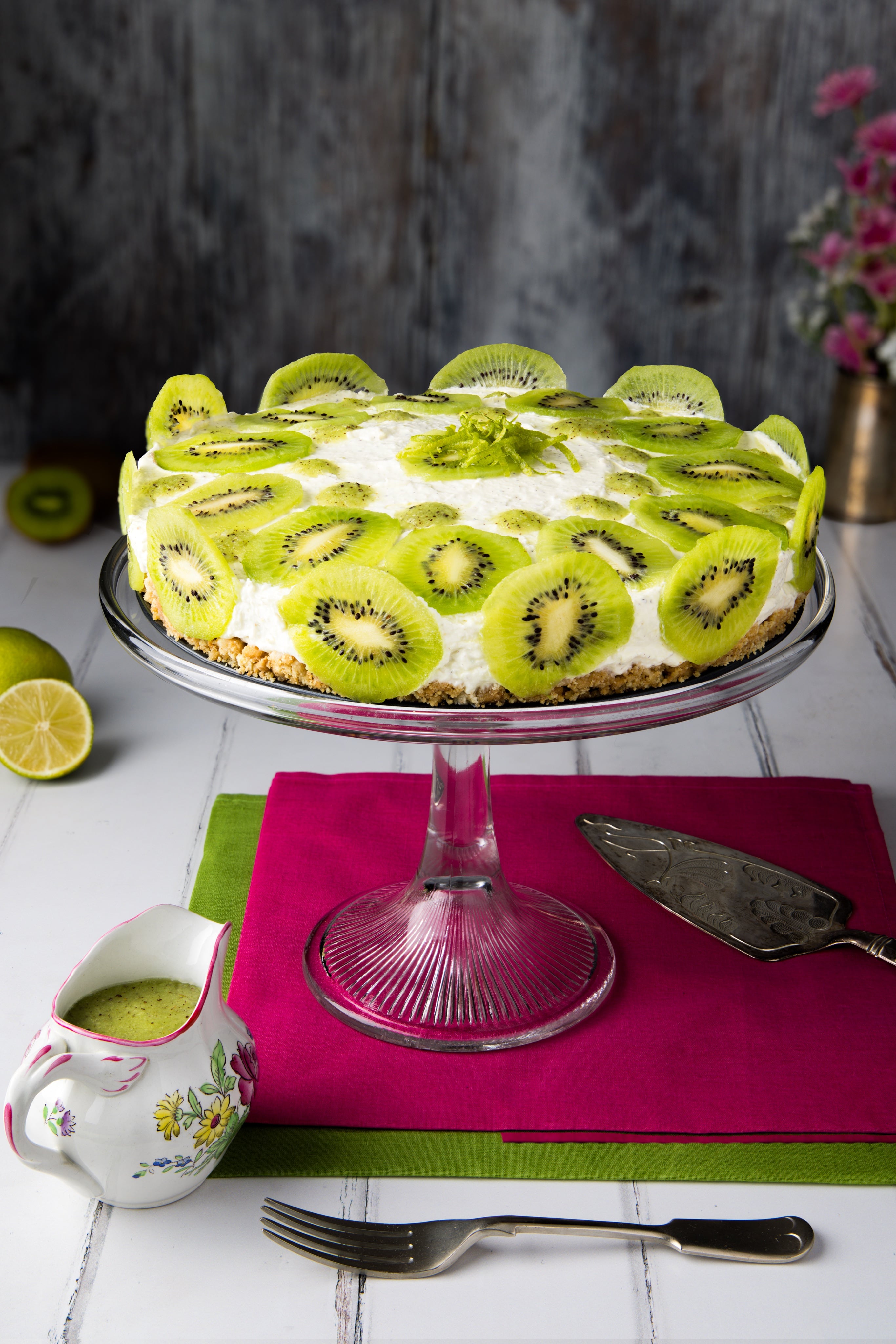 A kiwi and lime cheesecake looks rather dramatic in the right environment! A creative food photograph by JaxMore Food and Drink Photography, shot in their Derby studio.