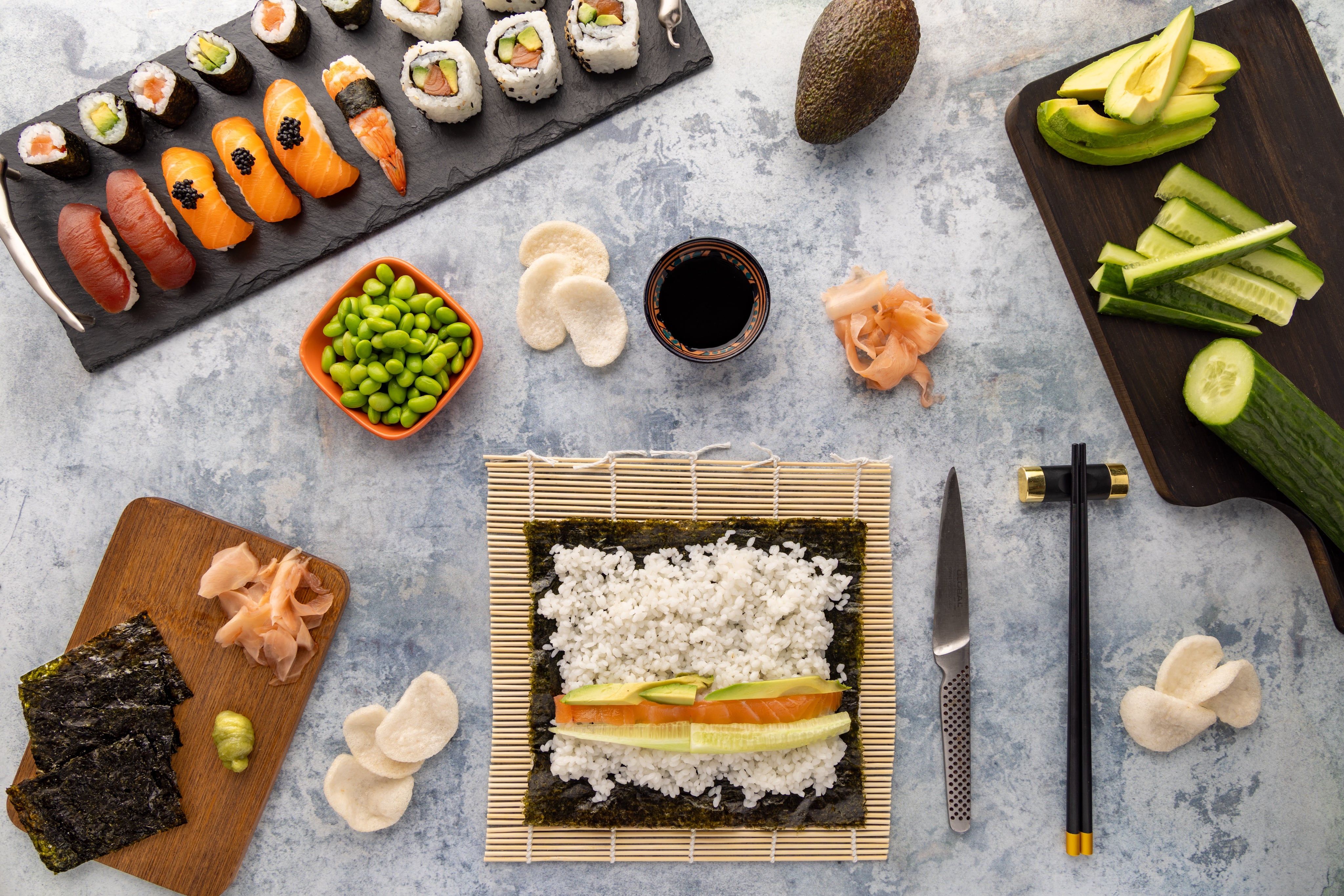 The freshest ingredients for sushi rolls, shot as a flat lay by JaxMore Food and Drink Photography, in their Derby studio.