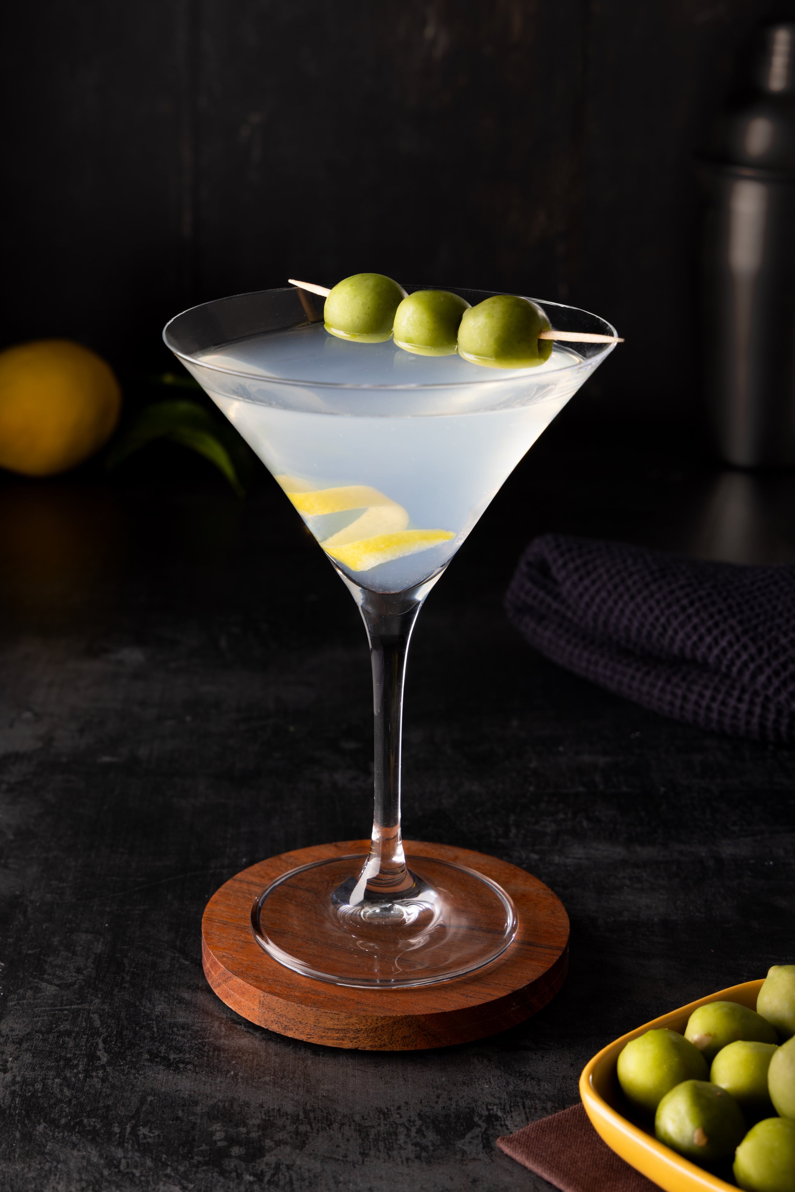 Perfectly Elegant Dirty Martini, in a sophisticated evening style. Photograph by JaxMore Food and Drink Photography, shot in their Derby studio.