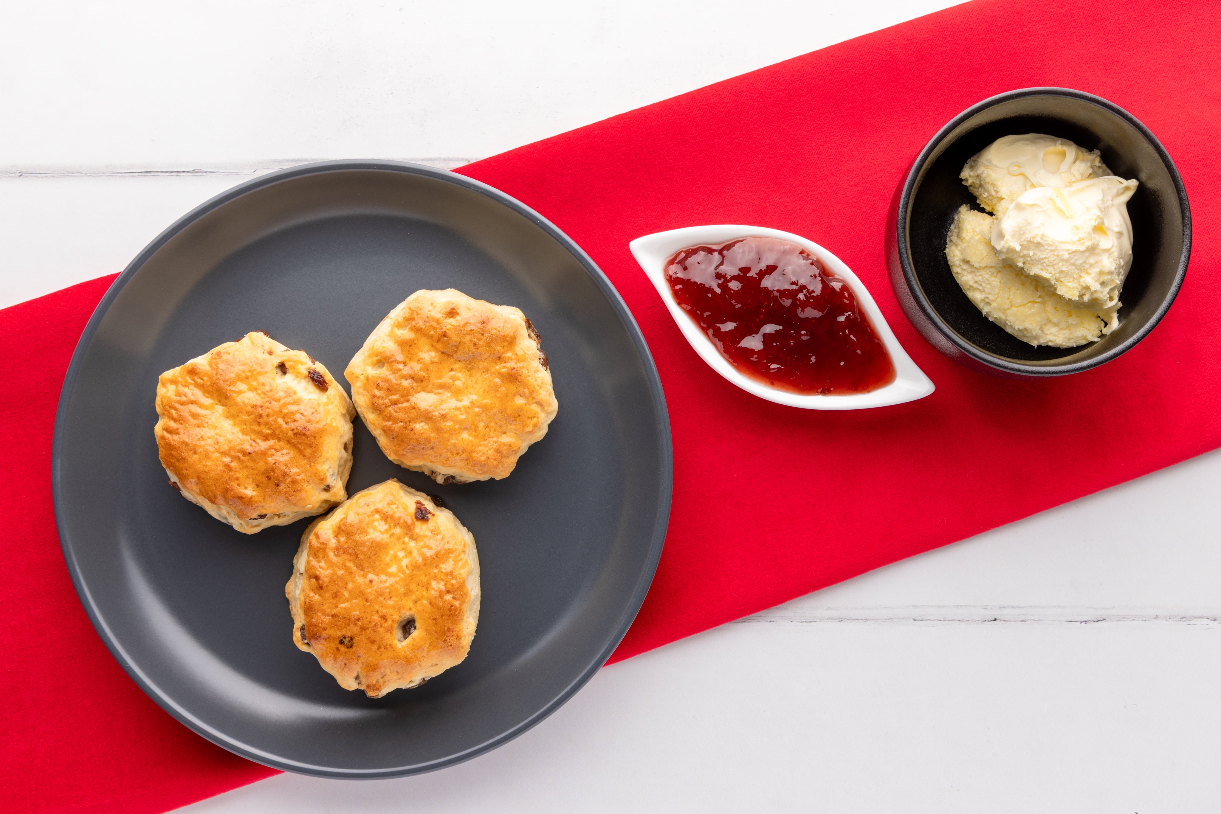 The classic cream tea: updated with a very modern, dramatic look. Styled and photograhed by JaxMore Food and Drink Photography, in their Derby studio.