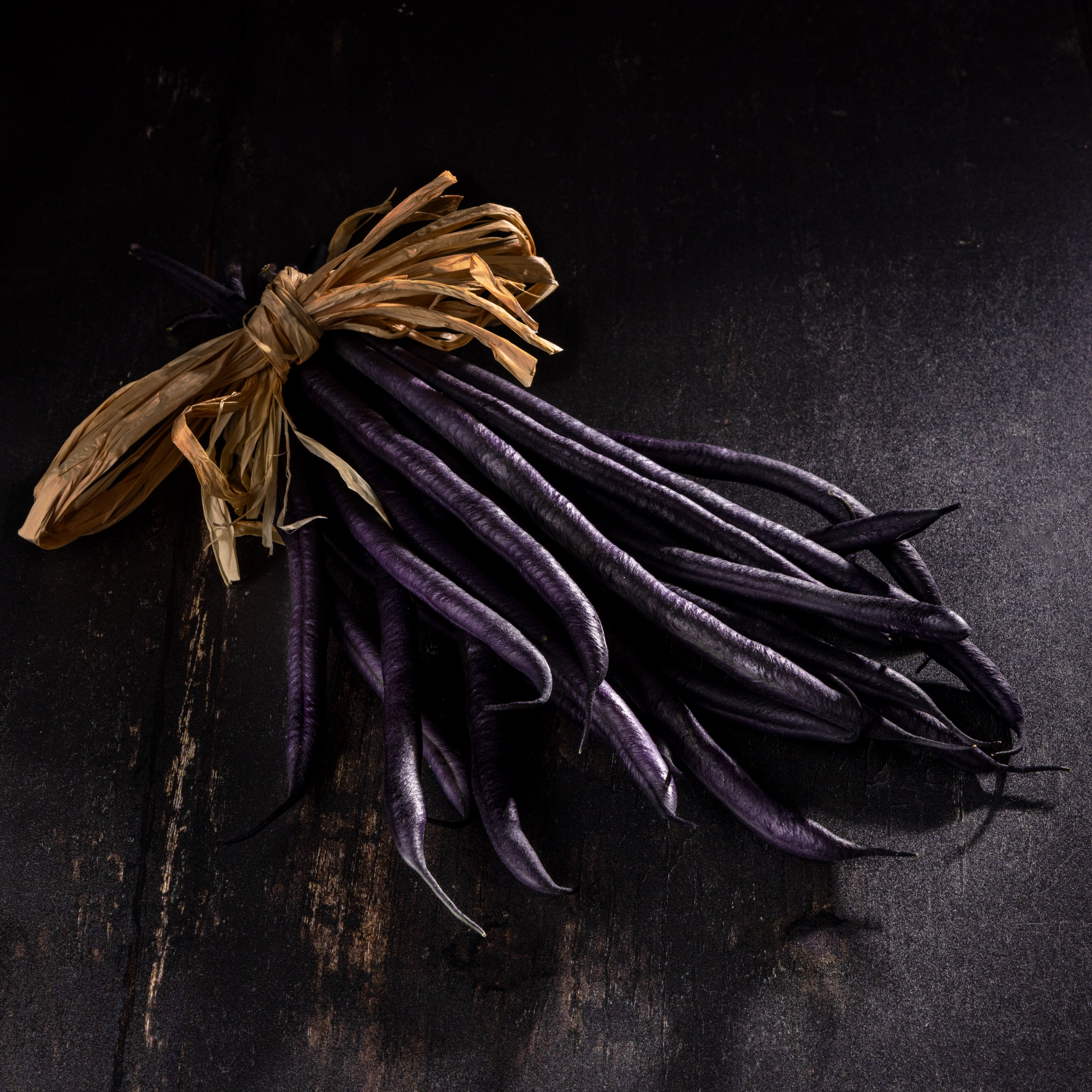 Stunning purple french beans, fresh from the garden. Shot by JaxMore Food and Drink Photography, in their Derby studio.