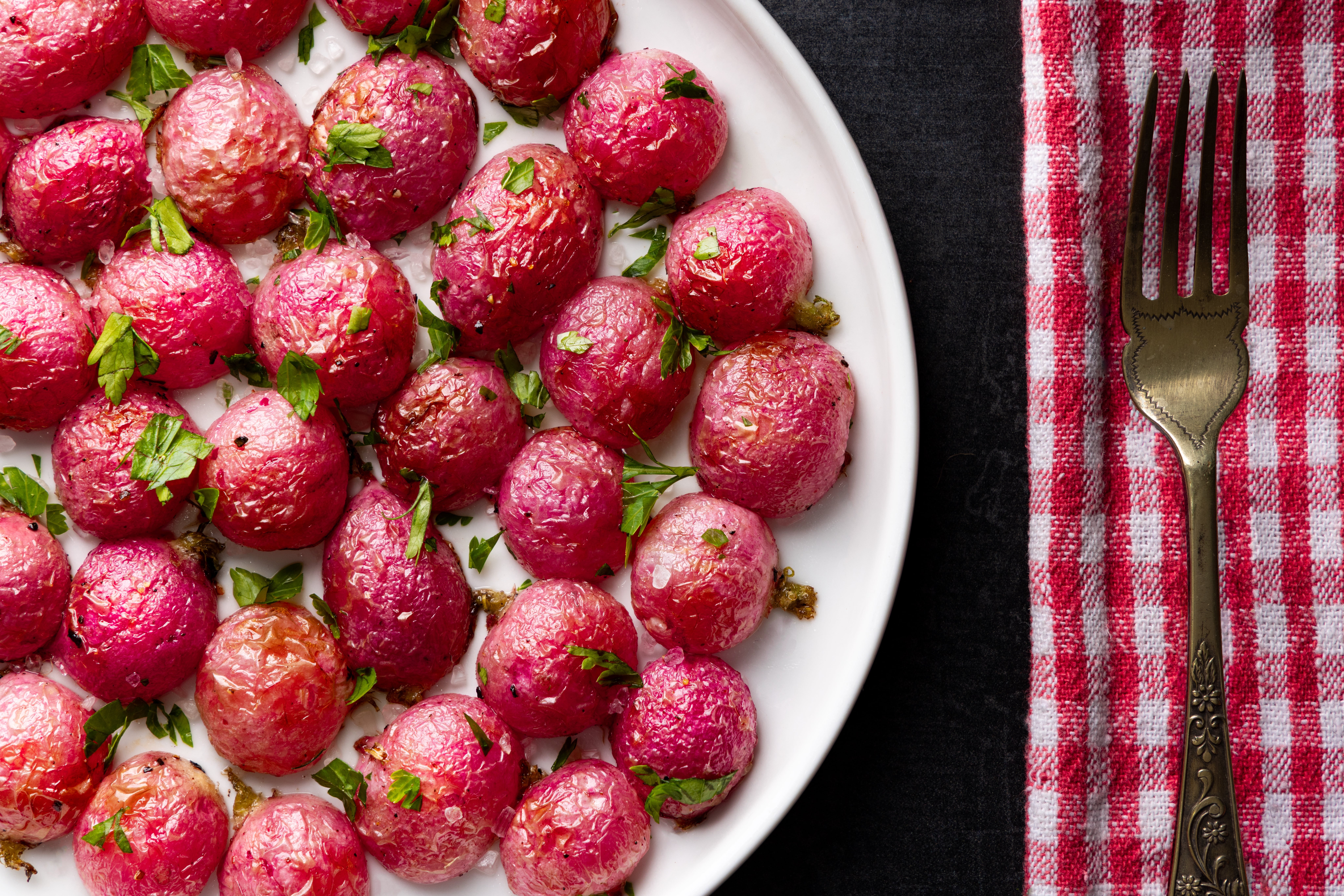 Simple roasted radishes, with fresh herbs and sea salt. Photographed by JaxMore Food and Drink Photography, in their Derby studio.
