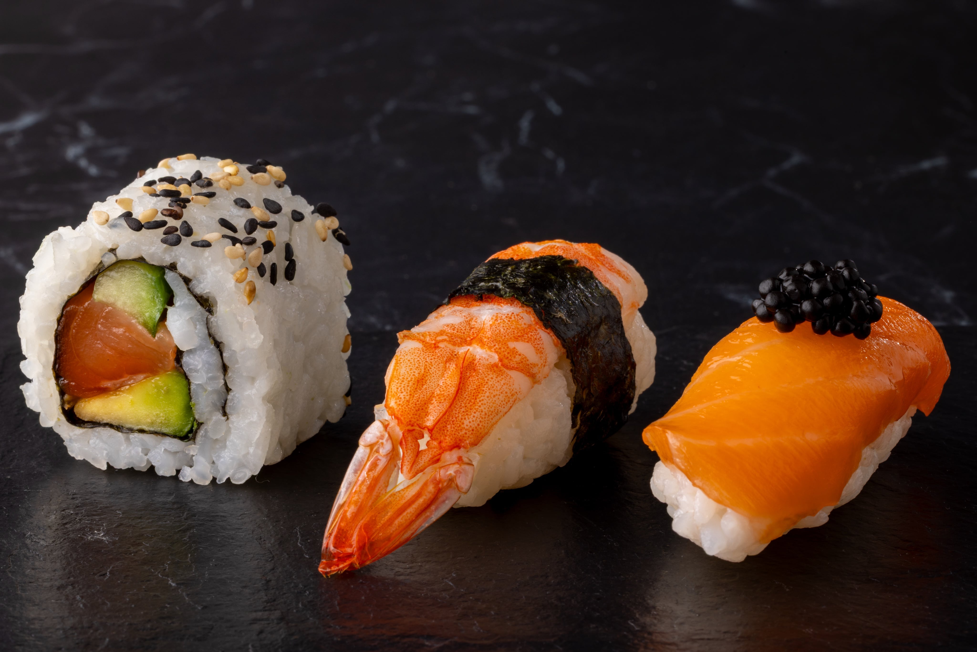 Three pieces of perfect sushi, photographed by JaxMore Food and Drink Photography, in their Derby studio.