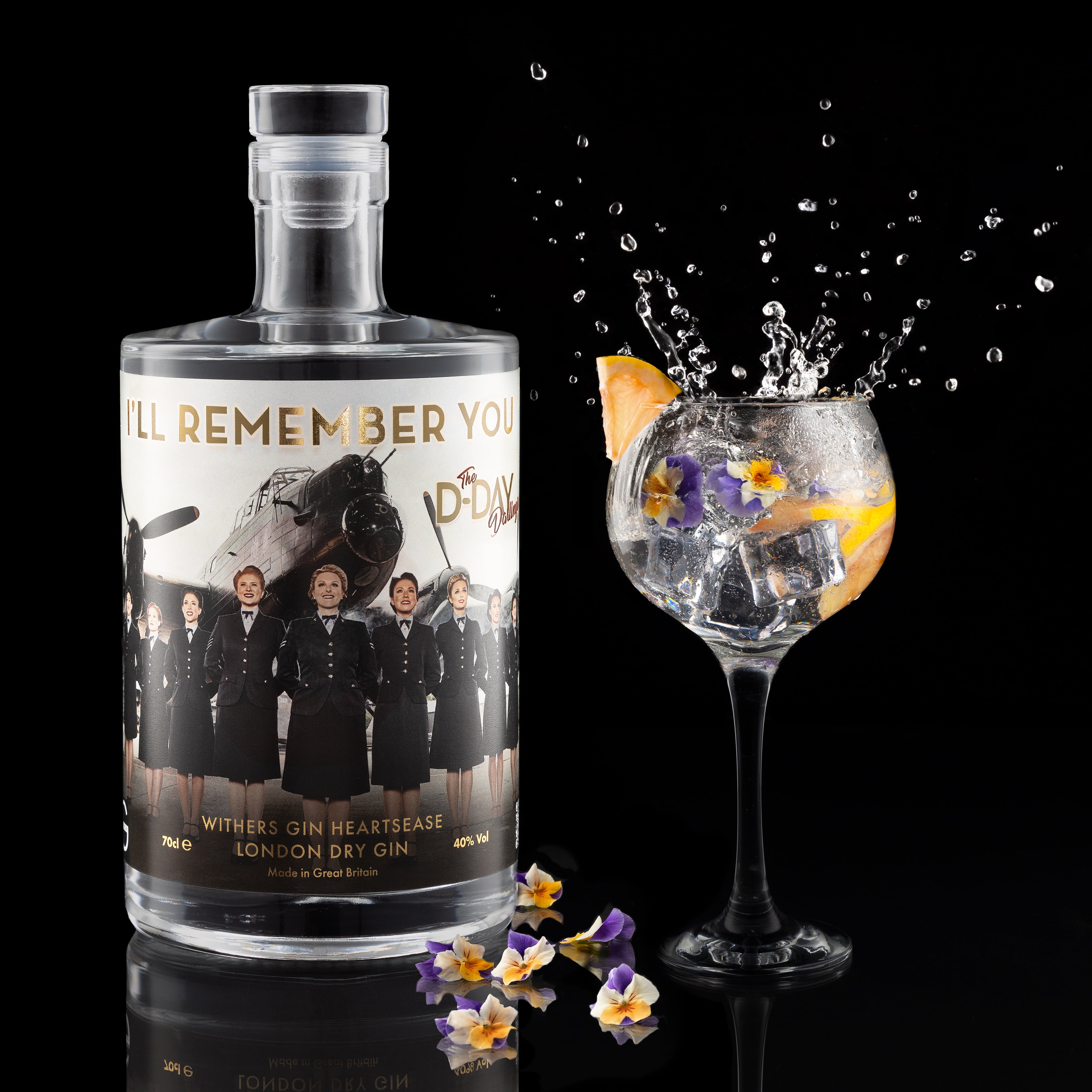 Creative photograph of a bottle of 'I'll Remember You' Gin, with a glass and splash. Photographed for Withers Gun by JaxMore Food and Drink Photography, in their Derby studio.