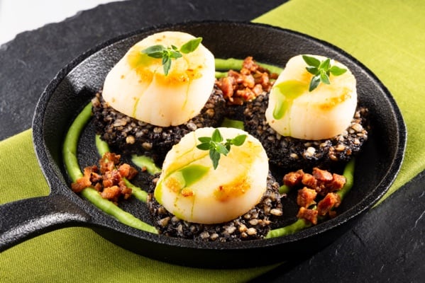 Seared Scallops, Black Pudding, Pea Purée and a Chorizo Crumb, styled and photographed by JaxMore Food and Drink Photography, in their Derby studio.